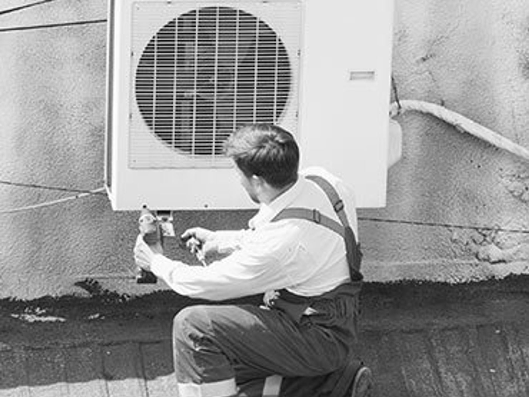 An installed rooftop air conditioning unit on a residential home.