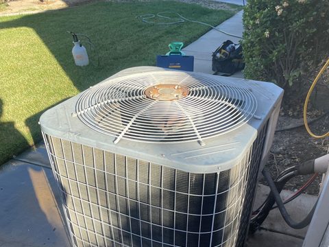 a new rooftop air conditioning unit installed on a residential home