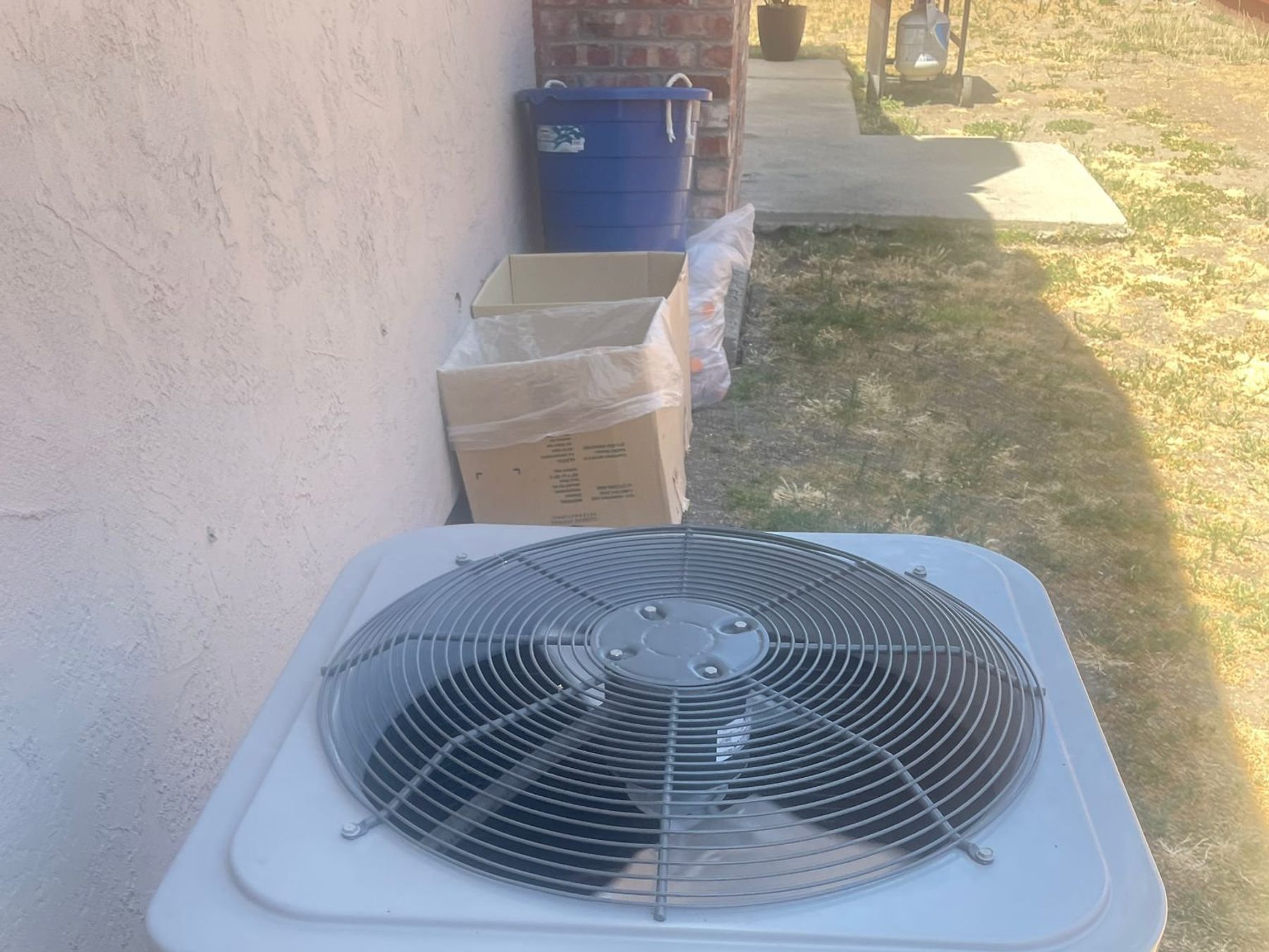 A completed rooftop unit installation with new ductwork connections.