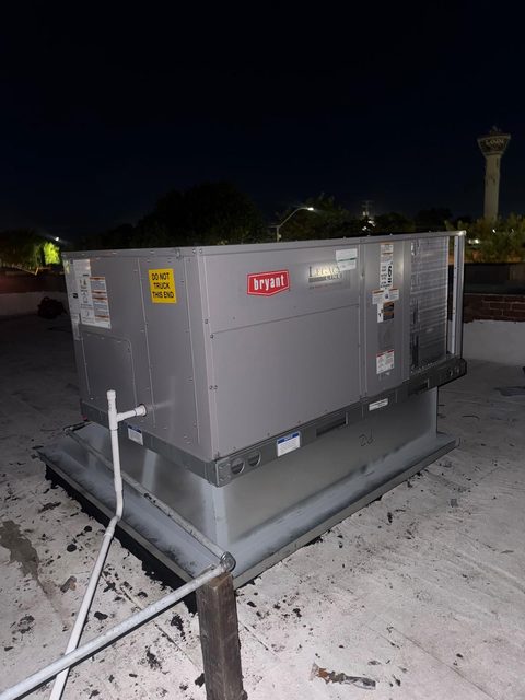 a rooftop air conditioning unit on a commercial building roof in Stockton, California